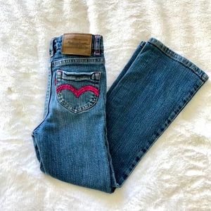 Girls Levi’s Slim Fit with pink sequence accents.